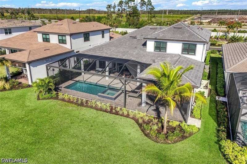 4 bedroom SingleFamilyResidence at 11401 Venetian Lagoon Dr, Esplanade Lake Club, Fort Myers — photo 2