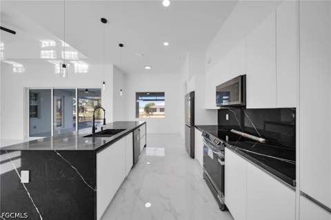 2712 NW 41st Ave, Cape Coral FL - photo 7 of 29