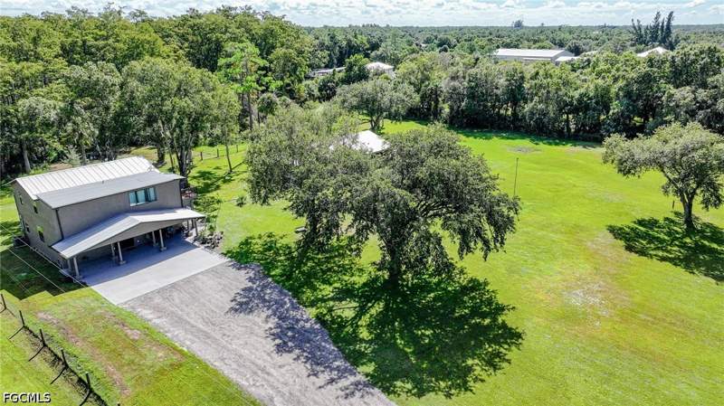 4 bedroom SingleFamilyResidence at 5961 Pangola RD, ORANGE RIVER RANCHETTES, Fort Myers — photo 5