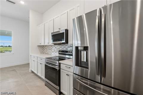 1241 NW 33rd Ave, Cape Coral FL - photo 11 of 45