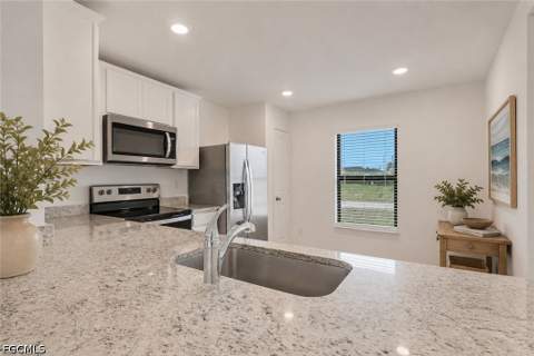 219 NW 25th Ter, Cape Coral FL - photo 6 of 42