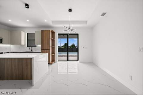409 NW 25th Pl, Cape Coral FL - photo 10 of 45