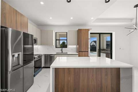 409 NW 25th Pl, Cape Coral FL - photo 16 of 45