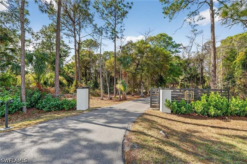 6 bedroom SingleFamilyResidence at 361 27th St SW, Golden Gate Estates, Naples — photo 2