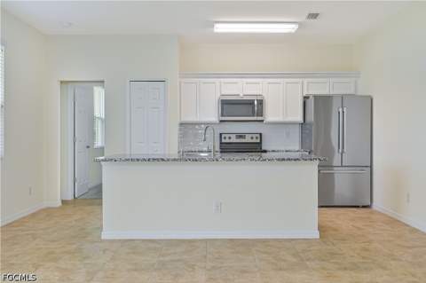 4402 NW 32nd Ter, Cape Coral FL - photo 12 of 33