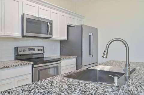 4402 NW 32nd Ter, Cape Coral FL - photo 13 of 33
