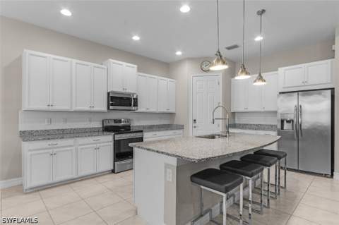 14539 Kelson Cir, Naples FL - photo 9 of 38