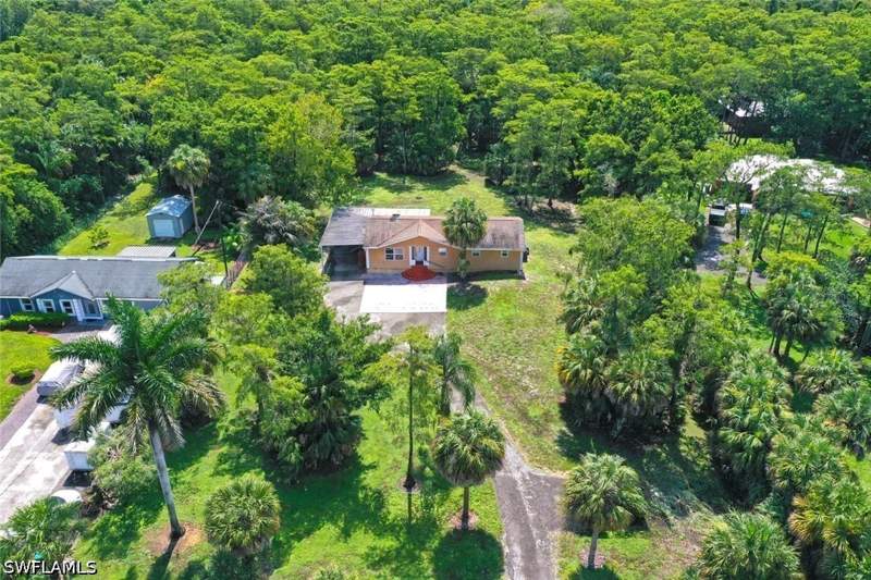 3 bedroom SingleFamilyResidence at 160 19th St NW, Golden Gate Estates, Naples — photo 2