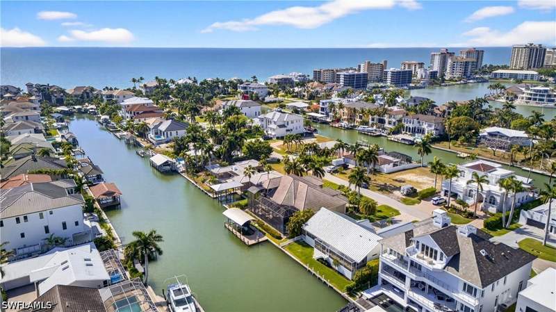 4 bedroom SingleFamilyResidence at 240 Channel Dr, Conners, Naples — photo 3