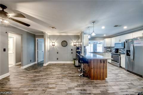 1131 SE 34th St, Cape Coral FL - photo 9 of 49
