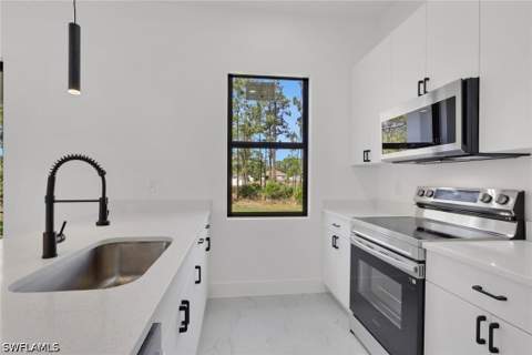 746 Colyer St E, Lehigh Acres FL - photo 13 of 29