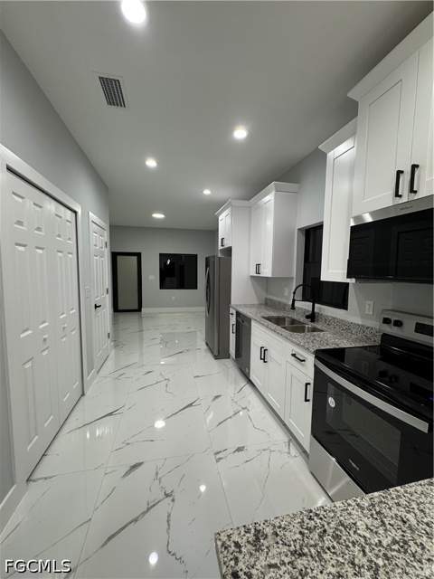 1178 Ebers St E, Lehigh Acres FL - photo 12 of 35