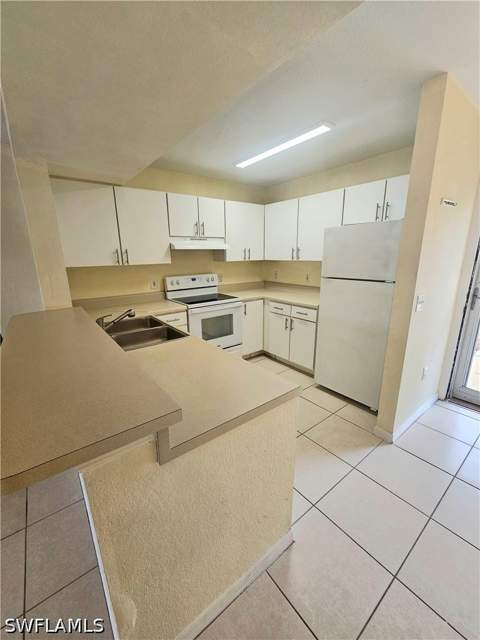 8284 Key Royal Cir 1312, Naples FL - photo 11 of 41