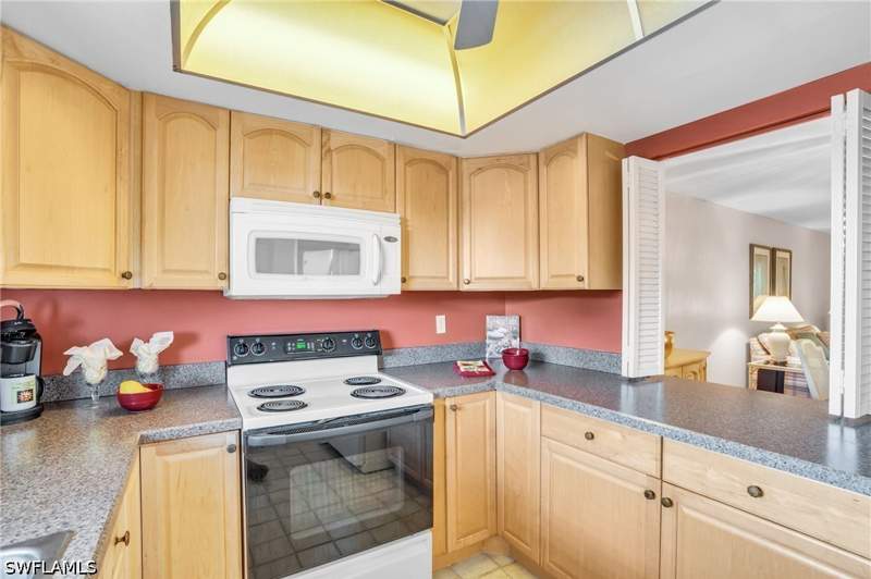 2 bedroom Condominium at 5419 Rattlesnake Hammock Rd 304F, Country Club Manor, Naples — photo 5