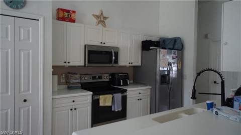 413 Truman Ave, Lehigh Acres FL - photo 10 of 32