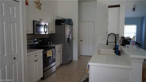 413 Truman Ave, Lehigh Acres FL - photo 9 of 32