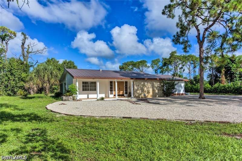 4 bedroom SingleFamilyResidence at 29 Caribbean Rd, Pine Ridge, Naples — photo 3