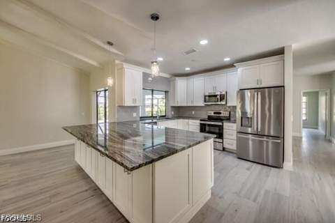 711 SE 33rd Ter, Cape Coral FL - photo 15 of 18