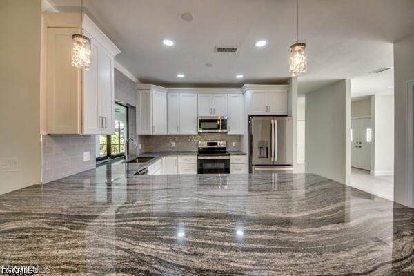 3 bedroom SingleFamilyResidence at 711 SE 33rd Ter, Cape Coral, Cape Coral — photo 5