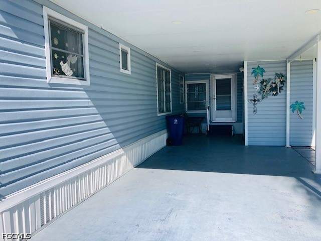 2 bedroom ManufacturedHome at 54 Channel Ln, Orange Harbor Mobile Home Park, Fort Myers — photo 2