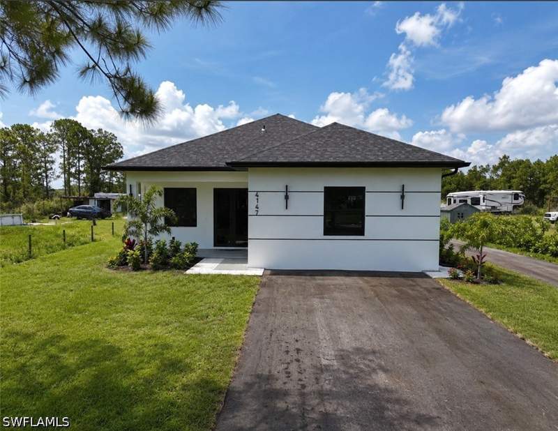 4 bedroom SingleFamilyResidence at 4147 64th Ave NE, Golden Gate Estates, Naples — photo 2