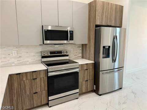 1208 NW 25th Pl, Cape Coral FL - photo 16 of 31