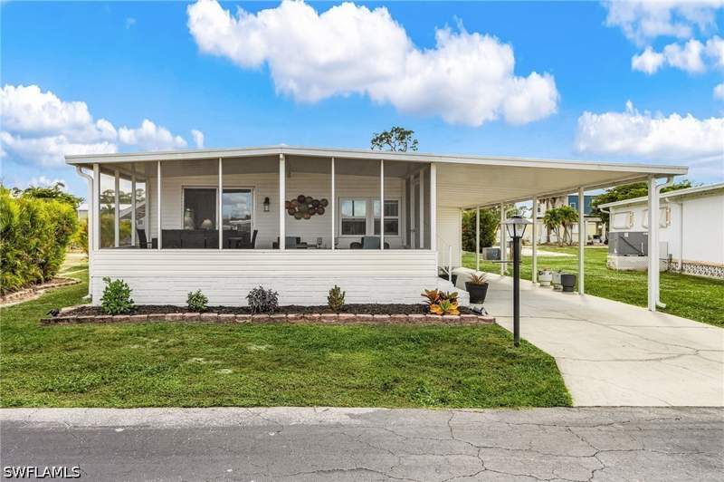 2 bedroom ManufacturedHome at 64 Sturbridge Ln, Coachlight Manor Mobile Home, Fort Myers — photo 2