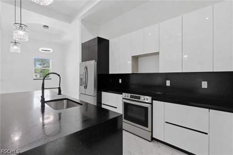 1314 Dayton Ave, Lehigh Acres FL - photo 14 of 45