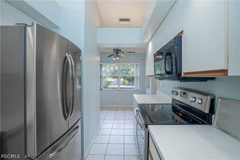 109 Wading Bird Cir 206, Naples FL - photo 11 of 38