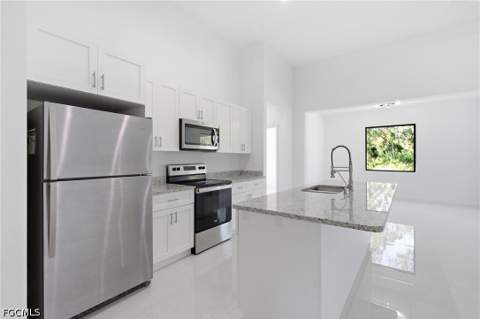 1002 E 5th St, Lehigh Acres FL - photo 15 of 45