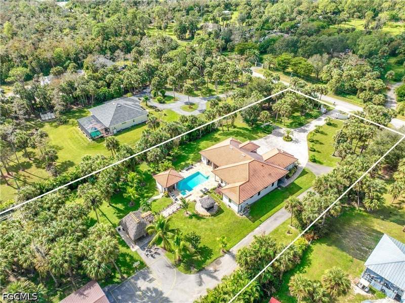 4 bedroom SingleFamilyResidence at 214 9th St NW, Golden Gate Estates, Naples — photo 2