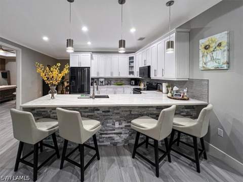 328 16th Ave NW, Naples FL - photo 13 of 49