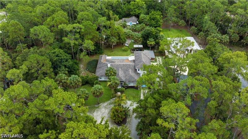 4 bedroom SingleFamilyResidence at 150 Logan Blvd N, Logan Woods, Naples — photo 2