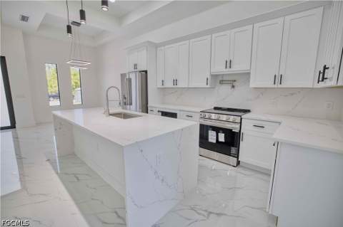906 Greenwood Ave W, Lehigh Acres FL - photo 8 of 49