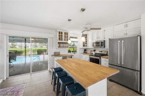 24708 Carnoustie Ct, Bonita Springs FL - photo 8 of 35