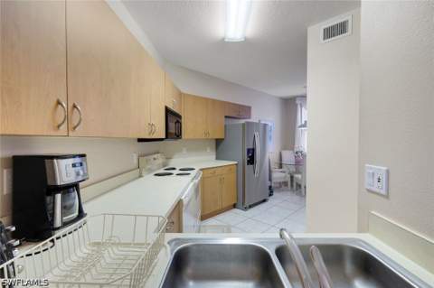 6384 Huntington Lakes Cir 103, Naples FL - photo 9 of 35