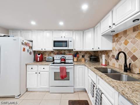 151 Cypress Way E E101, Naples FL - photo 10 of 26