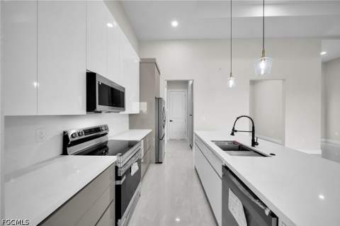 216 NE 25th Ter, Cape Coral FL - photo 12 of 45