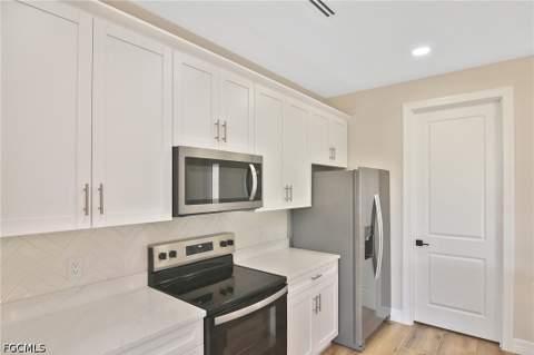 1906 NW 28th Ave, Cape Coral FL - photo 9 of 45