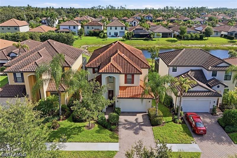5 bedroom SingleFamilyResidence at 4381 Madagascar Palm Way, Raffia Preserve, Naples — photo 2