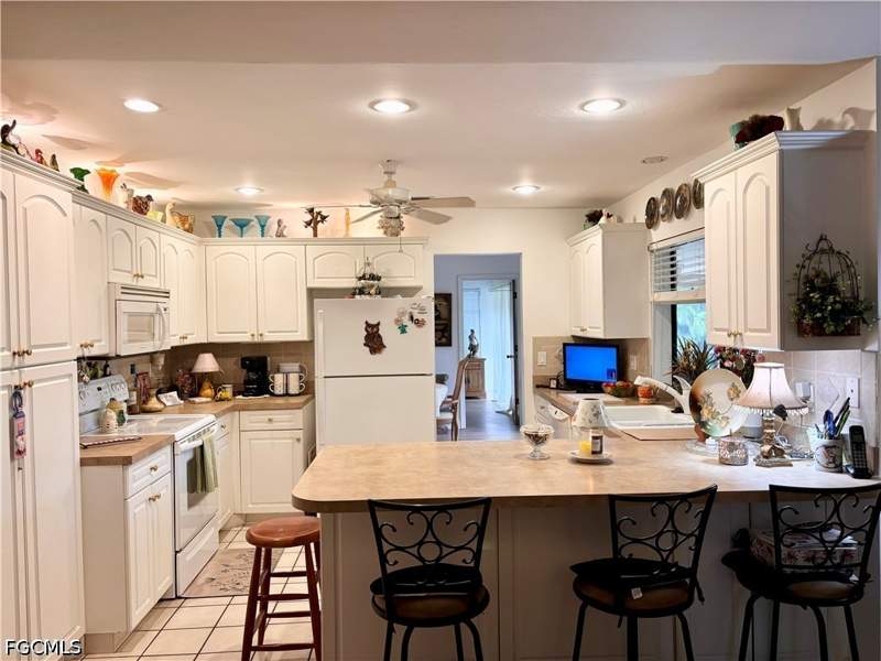 3 bedroom SingleFamilyResidence at 810 El Dorado Pkwy W, Rose Garden, Cape Coral — photo 4
