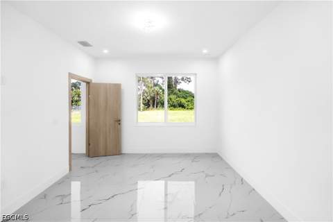 718 Robert Ave, Lehigh Acres FL - photo 12 of 32
