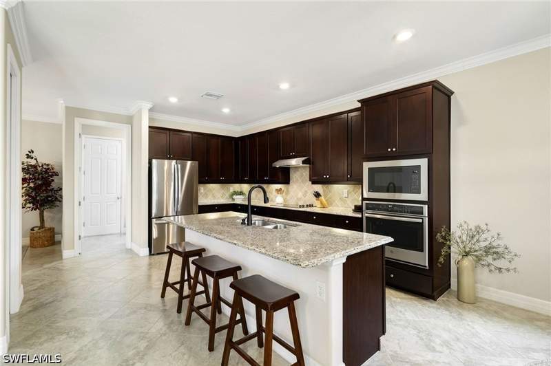 5 bedroom SingleFamilyResidence at 19012 Elston Way, The Place At Corkscrew, Estero — photo 4