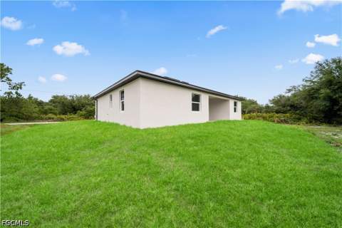 1506 Richmond Ave N, Lehigh Acres FL - photo 6 of 34