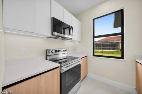 810 Carlfield Ave, Lehigh Acres FL - photo 13 of 44