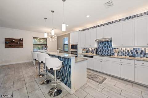 14106 Mindello Dr, Fort Myers FL - photo 7 of 40