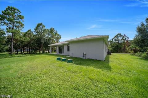 516 Dayton Ave, Lehigh Acres FL - photo 7 of 49