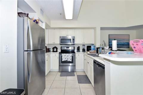1275 Wildwood Lakes Blvd 303, Naples FL - photo 8 of 19