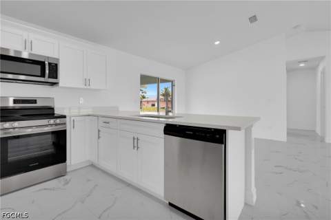 310 NE 9th Ter, Cape Coral FL - photo 12 of 37