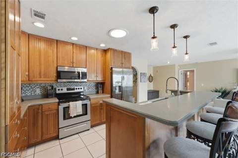 902 El Dorado Pkwy E, Cape Coral FL - photo 11 of 29